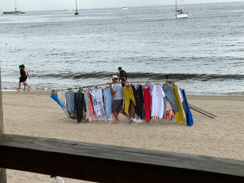 beach man selling clothes in punta del este