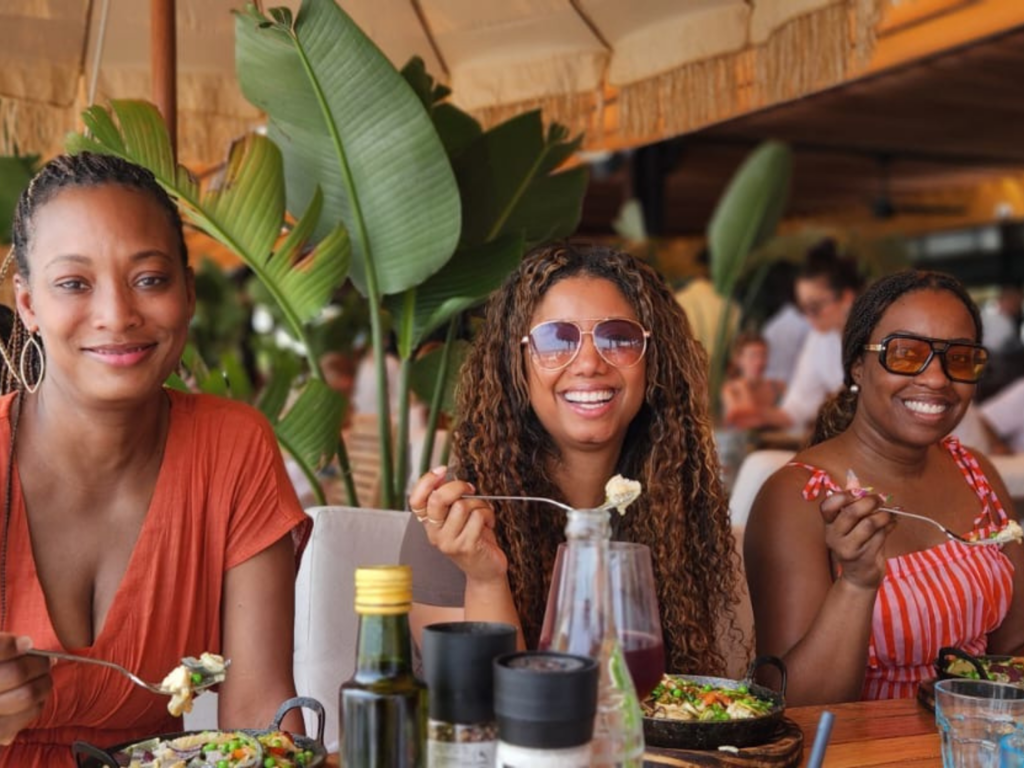 3 Women having lunch at the Parador Imarangatu Beach Club